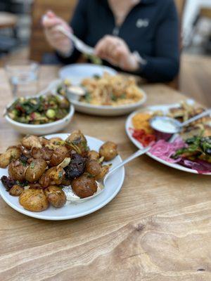 Crispy smashed potatoes, Brussels, calamari/shrimp and mezze platter.