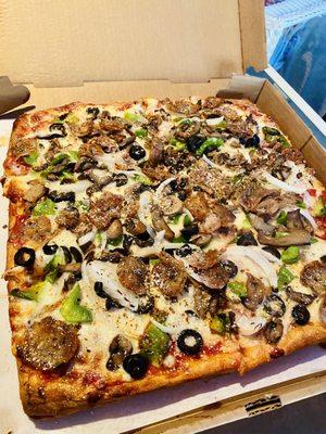 Sicilian w/ sausage onions, green peppers, mushroom, black olives