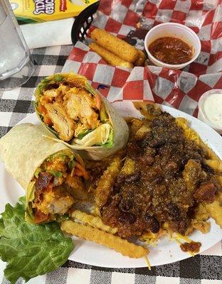 Buffalo Fried Chicken Wrap with Chili Cheese fries (shredded cheese instead of nacho cheese sauce) Their Chicken Fingers are the BOMB.com