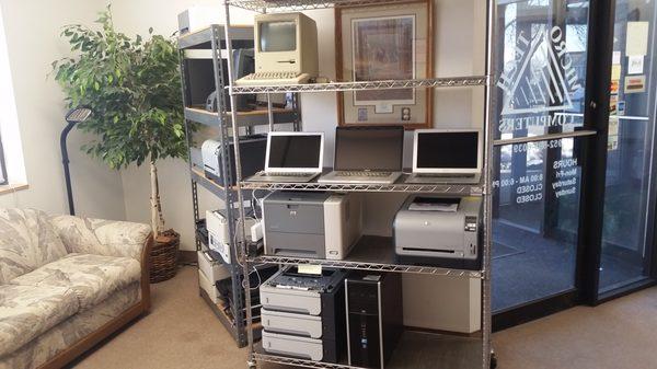 Reception seating and additional used HP Laser printers and desktop computers.