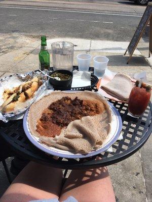 Lamb Qey Wat, mesir wat, collards, Ethiopian cheese steak sandwich and Bloody Mary :)