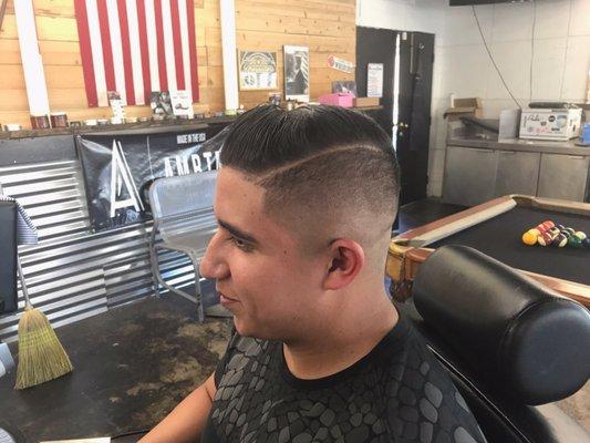 Skin fade with hard part