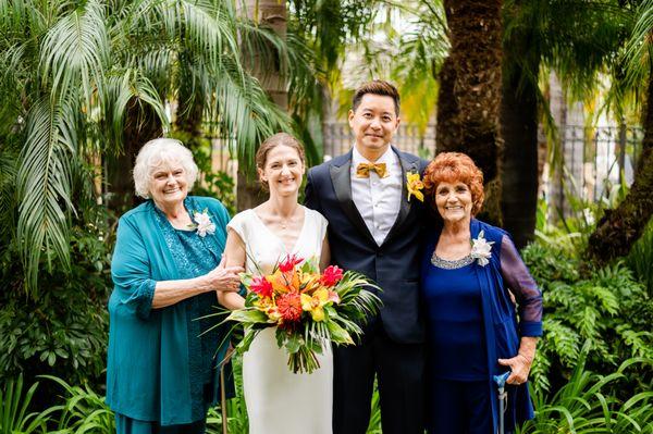 family photo with bridal bouquet and corsages Photo credit: Stills by Zariah https://www.stillsbyzariah.com/