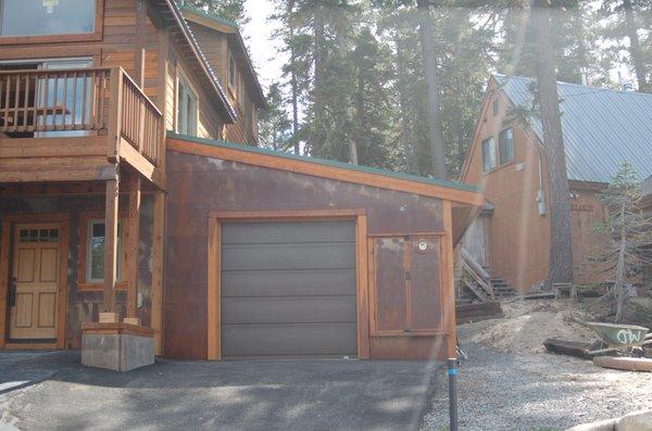 Design/Build for a garage addition, new windows, wood floors, new back deck and ground source heat pump on Donner Summit