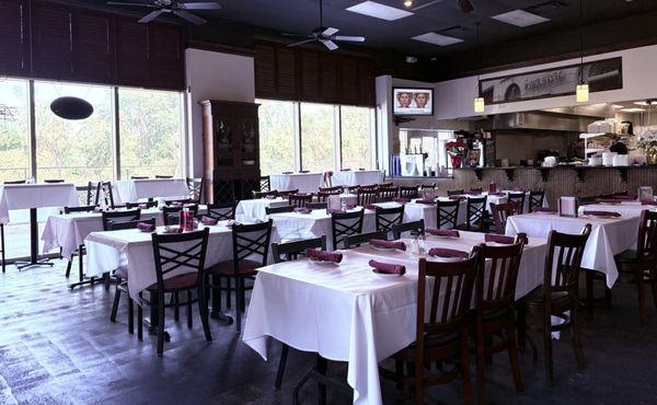 Nice, large dining area...with high tops by the window.