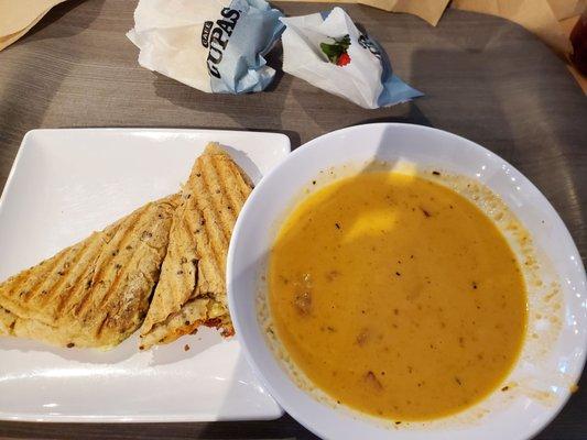 Grilled cheese with lobster bisque soup, bread, and strawberry.