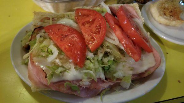 Deluxe sub on homemade bread with homegrown tomatoes!