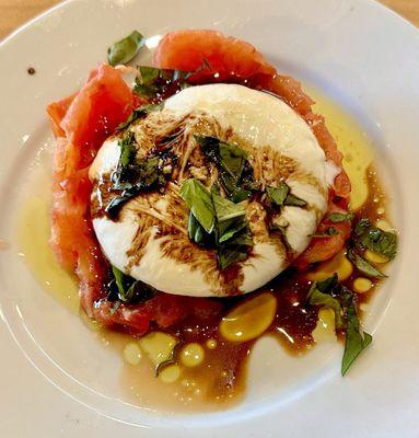 Black truffle Burrata stuffed in a tomato