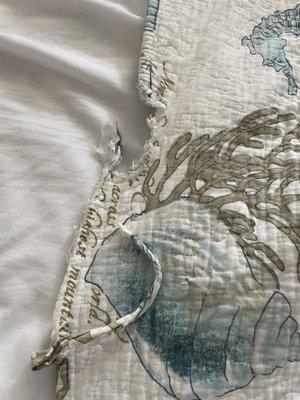 Tattered comforter