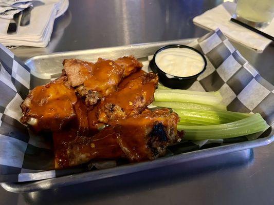 Wings are great! This picture isn't.  - wish the sauce was tossed in instead of poured on, but there's plenty.