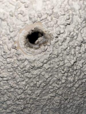 Hole one in bedroom ceiling