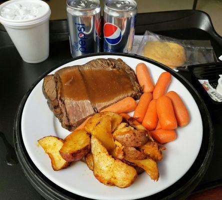 Yesterday's supper of pot roast, roasted red potatoes, and parmesan carrots with diet Pepsi and sugar cookie