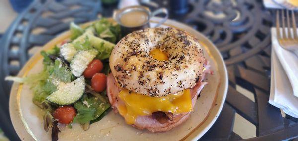 Bumble Bee Breakfast Sandwich.  Black Forest Ham (7 Oz), Applewood smoked Bacon, Overhard Egg, Sharp Cheddar Chs on a bagel of your choice.