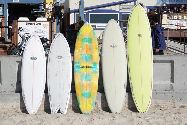 A wide selection of surfboards from Rusty, Hank Warner, Tim Patterson, Linden, and Sea Brothers.