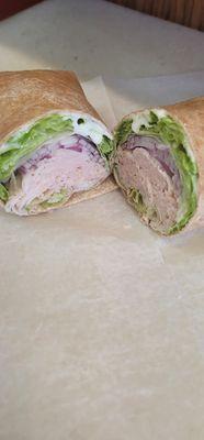 Turkey red onions lettuce  ranch  on a wrap