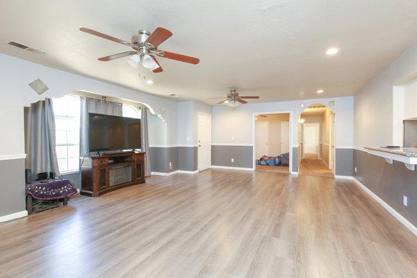 Laminate flooring in living room and gameroom