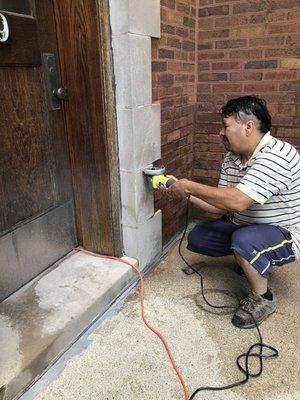 Repairing the bricks and limestone and apply new mortar cement between the bricks