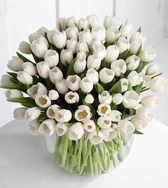 A bubble bowl of nice double headed white tulips brings unique elegance at any occasion!