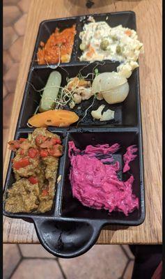 Spread tray with Olivier, Ajvar, White Bean Hummus, Beet Tzatziki and Veggies