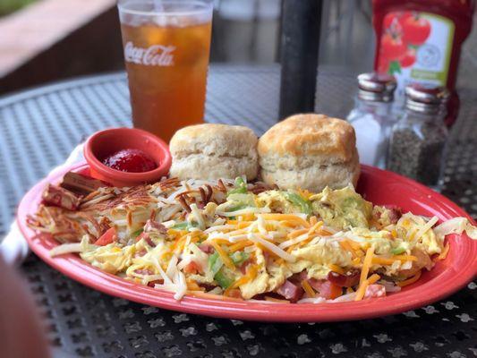 Black Oak Kielbasa scramble with sausages & veggies, 2 biscuits, but tasteless hash browns! Eggs were tasty.