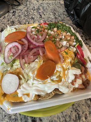 Nachos with beef (or any protein of your choice). It weights almost 3lb!!! And it was only $10!