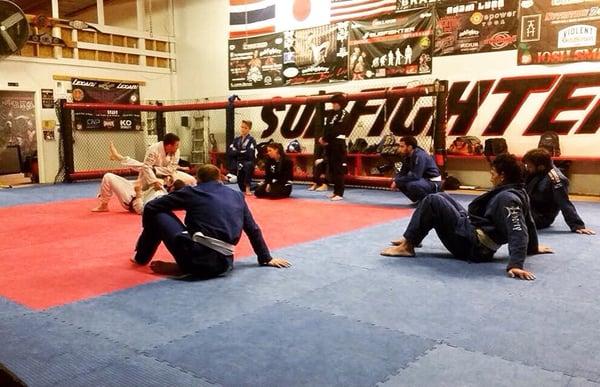 Coach Justin teaching the 730pm Gi Jiu-Jitsu class