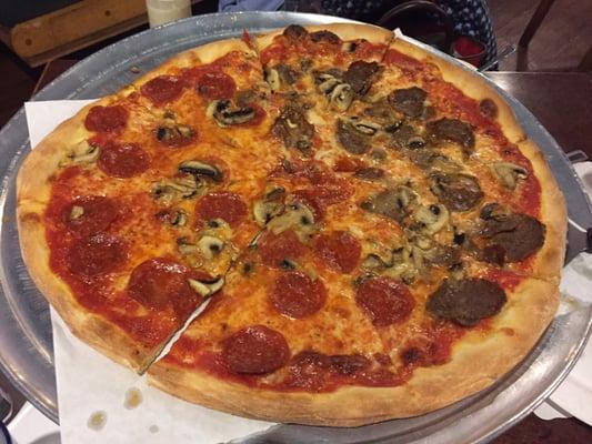 Half pepperoni, half sausage, mushrooms on all