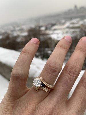 My beautiful custom engagement ring by Alex: pink gold, diamonds and my grandma's sapphire, sparkling against snowy castles in Budapest!