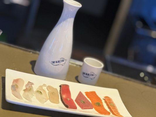 Sake and a sample of each of the fish from our platter