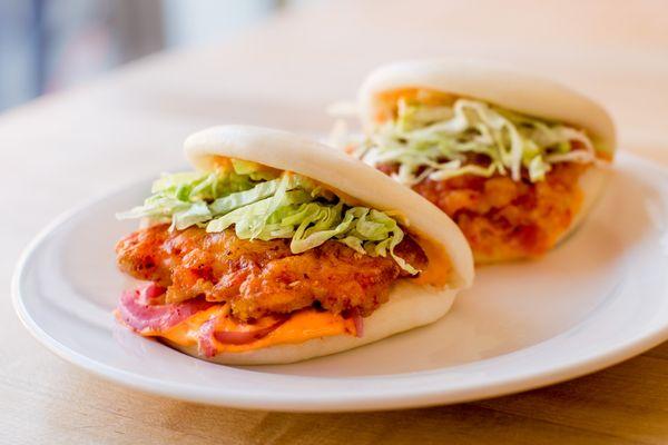 Seared Shrimp Buns with spicy mayo and pickled red onion.