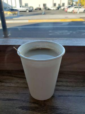 Hot coffee on the windowsill