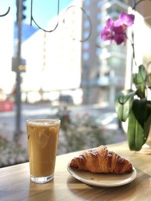 Iced latte and croissant