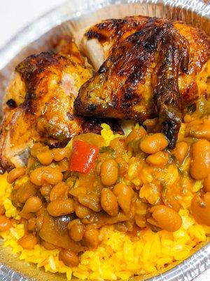 Peruvian chicken grilled to perfection with yellow rice and beans.