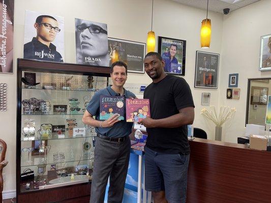 Meta World Peace is visiting our office today, shopping for frames and also getting signed books from the author and Doctor himself!