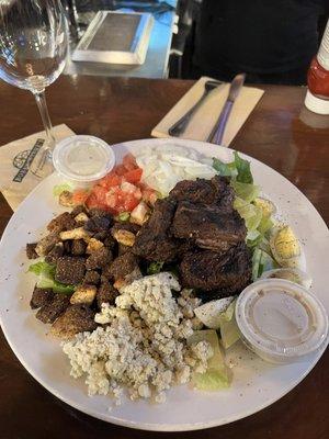 BBQ Chicken Cob Salad - Tritip Steak instead of chicken. Onions and tons of rye croutons. Not really a cob salad.