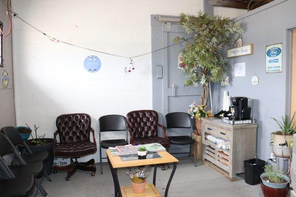 Waiting room with complimentary coffee for all customers.