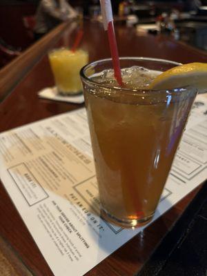 Long Island iced tea and a fuzzy navel in the background