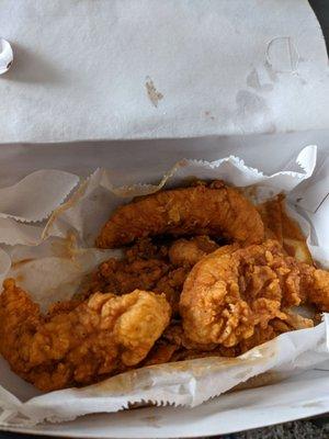 Chicken tenders tossed in buffalo sauce