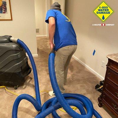 1-800 Water Damage of Denver water extraction on  a carpet flooring