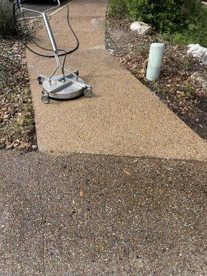 The difference bye Powerwashing the sidewalk