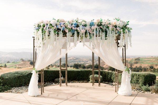 Arbor silk florals with draping by flowerdivas PC: Erica Vernis Photography