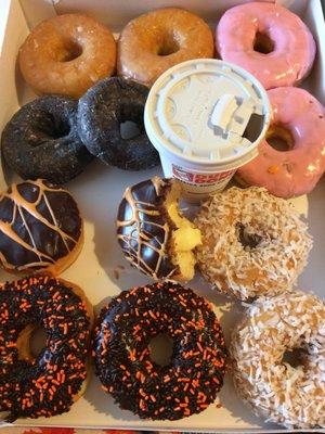 A dozen donuts (11 1/2 actually =)  and a small Almond JOY hot chocolate. Mmmmmm!