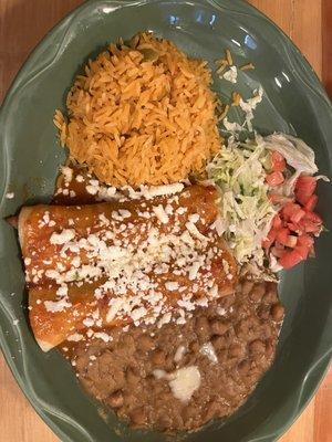 Shredded beef Enchiladas are some of the best i've ever had, delicious re-fried beans and fluffy rice.