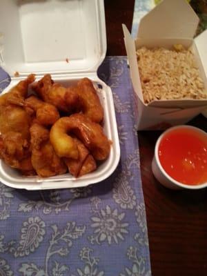 D5 dinner combination. 5 pieces of sweet and sour chicken with fried prawns and an egg roll.