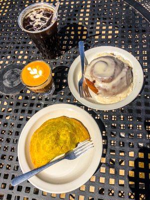 Iced Americano, cortado, stuffed veggie pastry (empanada-esque), OMG cinnamon roll