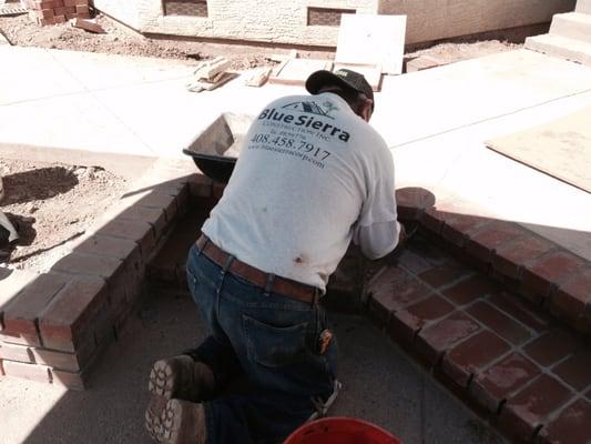 Installation of new red brick veneer, in San Jose, CA.