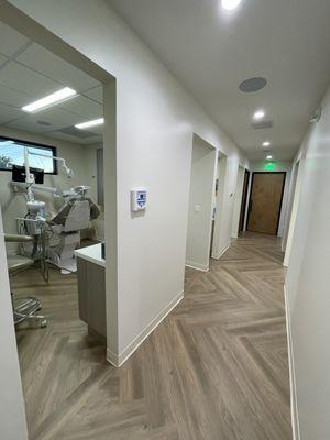 Hallway to additional treating rooms