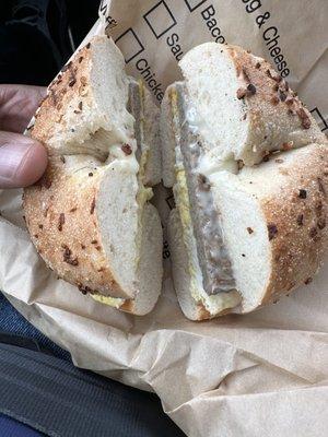 Turkey sausage egg and cheese on onion bagel