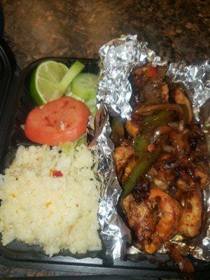 Fajitas de pollo, mushy rice and no beans.