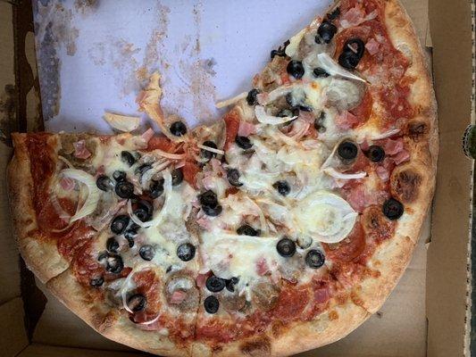 Special pizza (all the meats, onions, olives, mushrooms, sweet peppers)..as you can see from the half eaten portions, we were starving